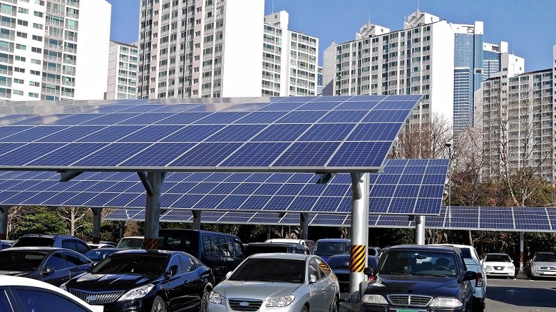 Solar panel installed in parking lot      ; Shutterstock ID 1025850622